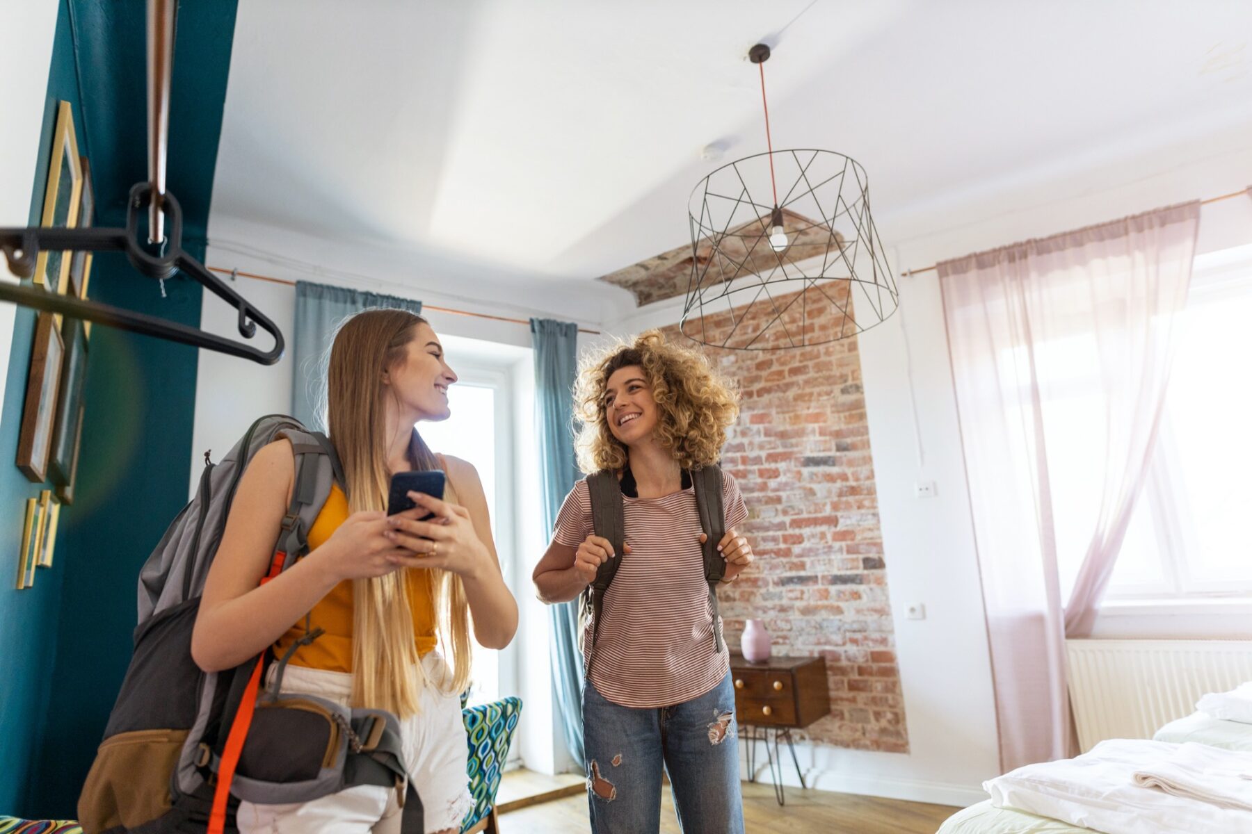 Young female tourists staying in youth hostel